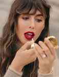 Image of swing red lipstick on lips