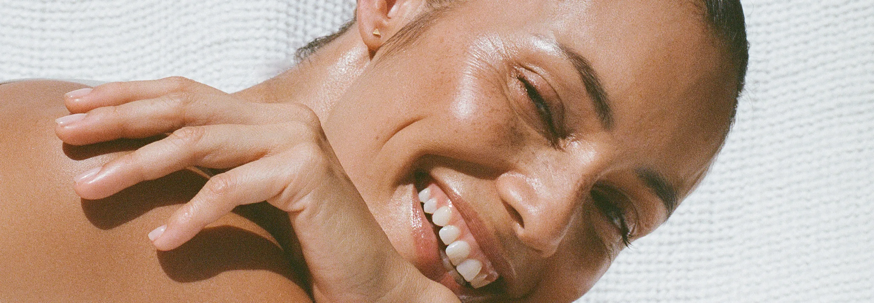 model smiling at the camera