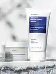 Korres probiotic superdose face mask and foaming cream cleanser on rough surface