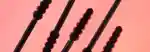 mecca max whip lash tubing mascara wands lined up next to each other
