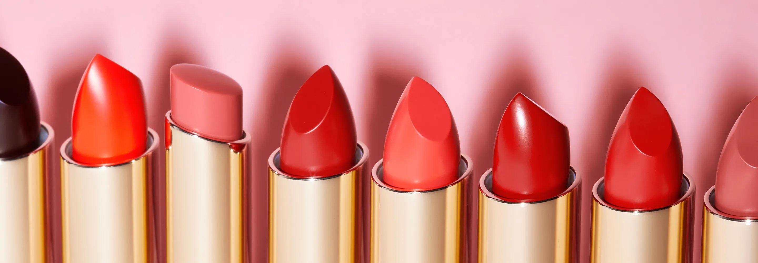 mecca max pout pop lipsticks and a pout pop sheer lipstick lined up