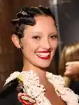 Model laughing backtage