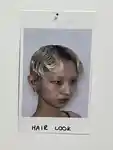 Polaroid of the model hair look backstage