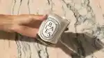 A collage of Diptyque images, including the Baies candle and celebrities such as Victoria and David Beckham, Lebron James and Carrie Bradshaw's character from Sex & The City
