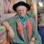 Bethan Laura Wood sitting in her studio