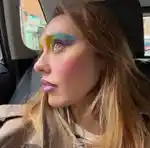 Emily Wood in a taxi