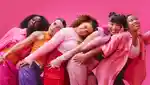 The L2R Dancers – Abul, Hena, Emily, Stephanie and Nolly – pose against a pink backdrop.