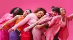 The L2R Dancers – Abul, Hena, Emily, Stephanie and Nolly – pose against a pink backdrop.