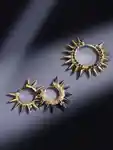 Spiked Maria Tash earrings.