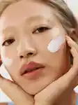 Model using moisturiser